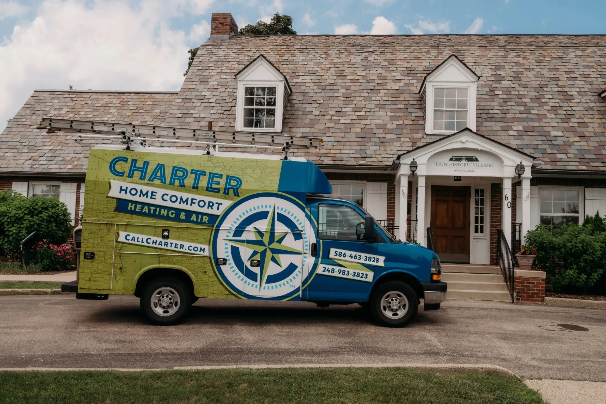 Charter home comfort van Parked in front the Main building in the Troy Historic Village in Troy, Mi