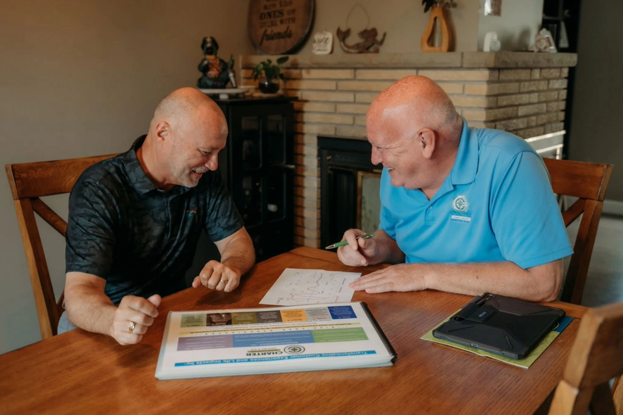 Charter Home Comfort advisor reviewing HVAC installation options with a homeowner